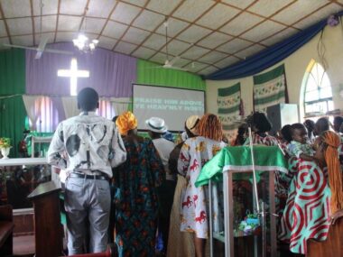 7-16-3 People standing in church during worhsip