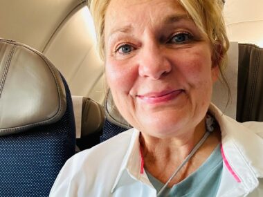 Sitting on Plane Rev. Gina sitting on airplane.