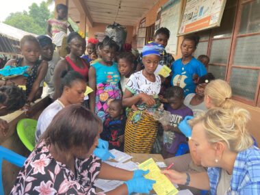 PHOTO-2024-07-10-07-43-32 (2) Rev. Gina providing medical care to the Fengehun villiage.