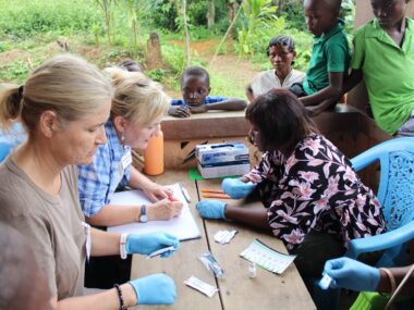 PHOTO-2024-07-10-12-20-54 Rev. Gina doing medical assessment for a Fengehun Villager
